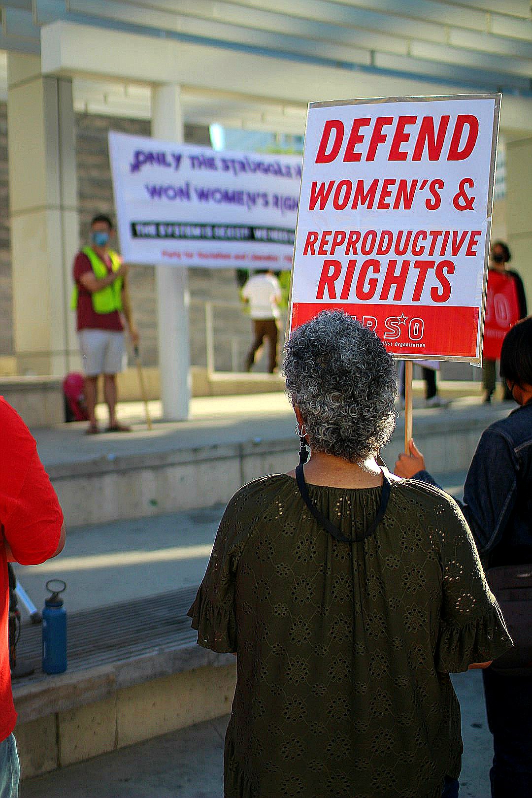 a person holding a sign