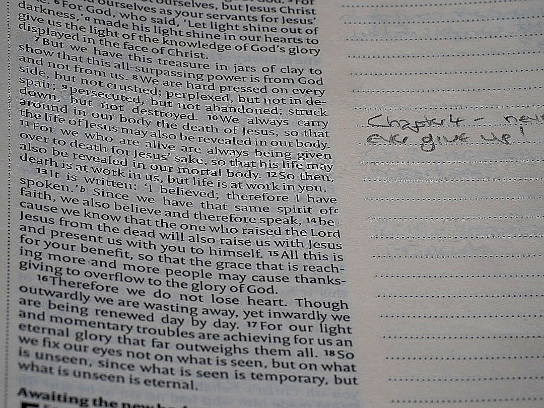 A close up of a book with writing on it