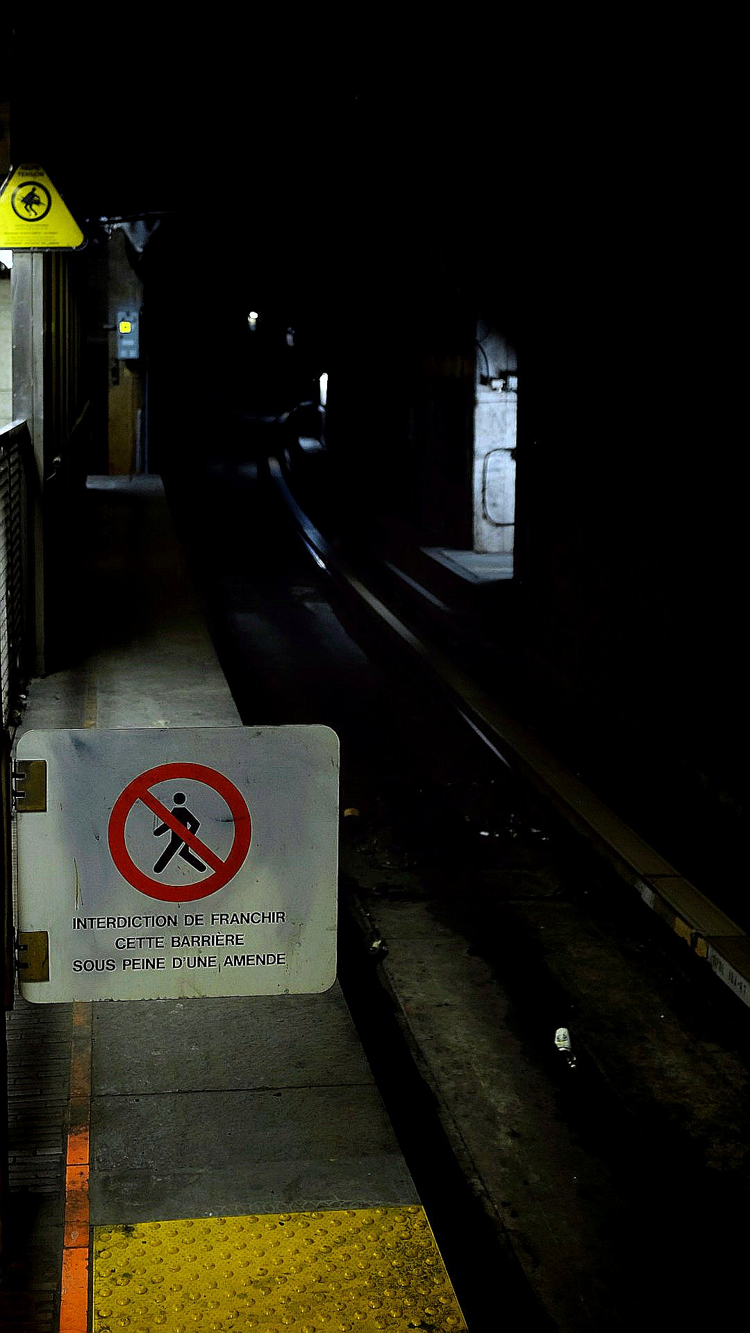 train station with no crossing signage