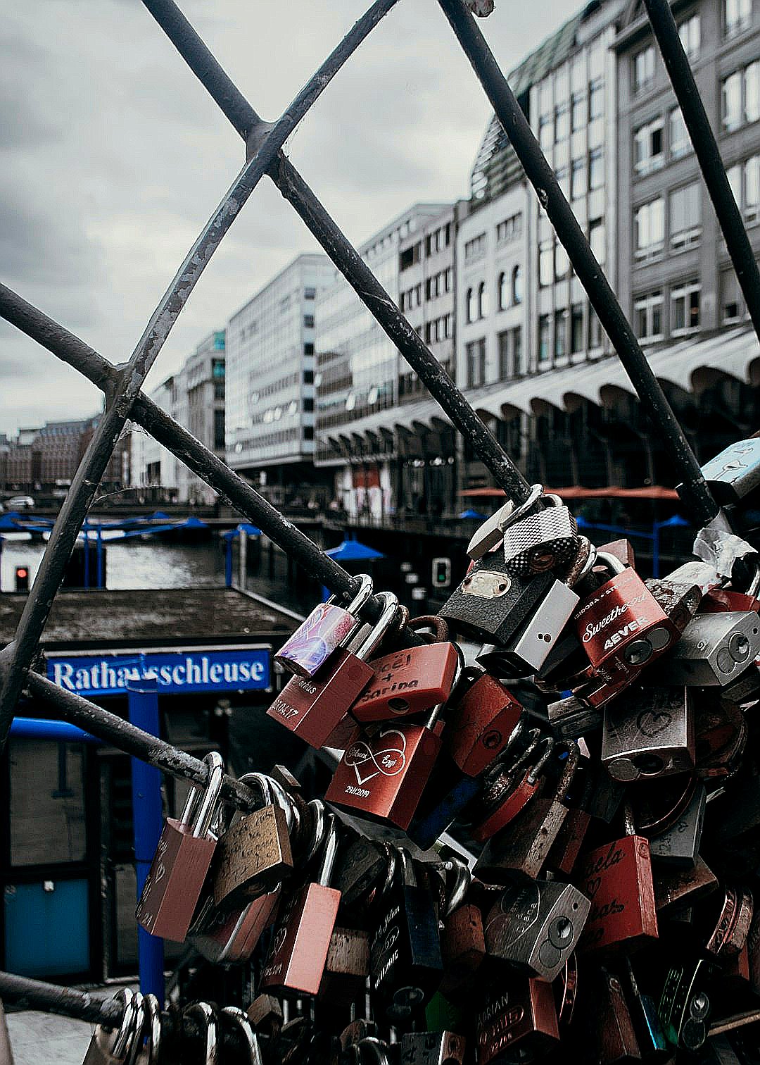 a group of shoes on a metal pole