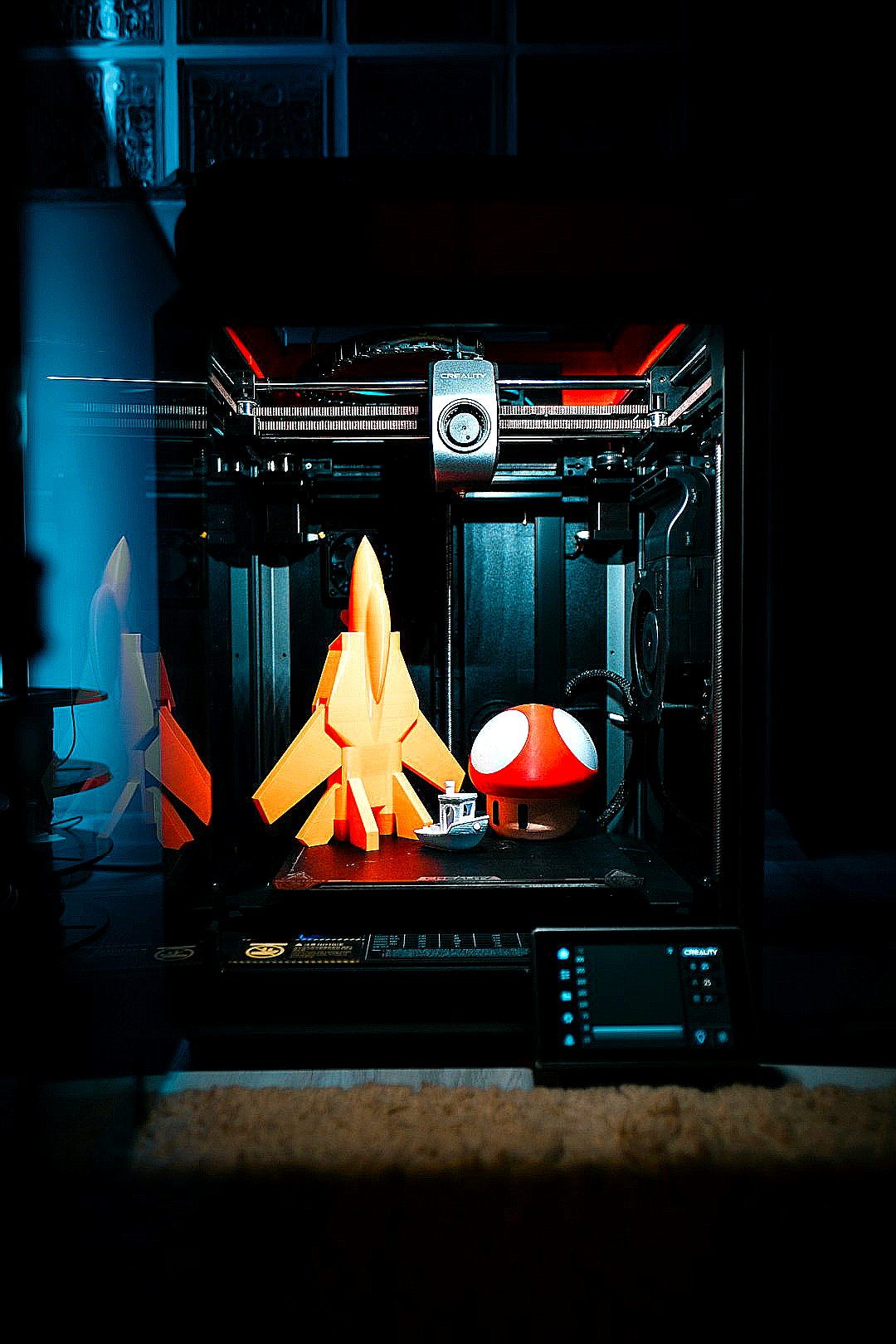 a small 3d printer sitting on top of a table