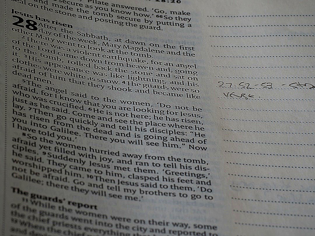 a close up of a book with writing on it