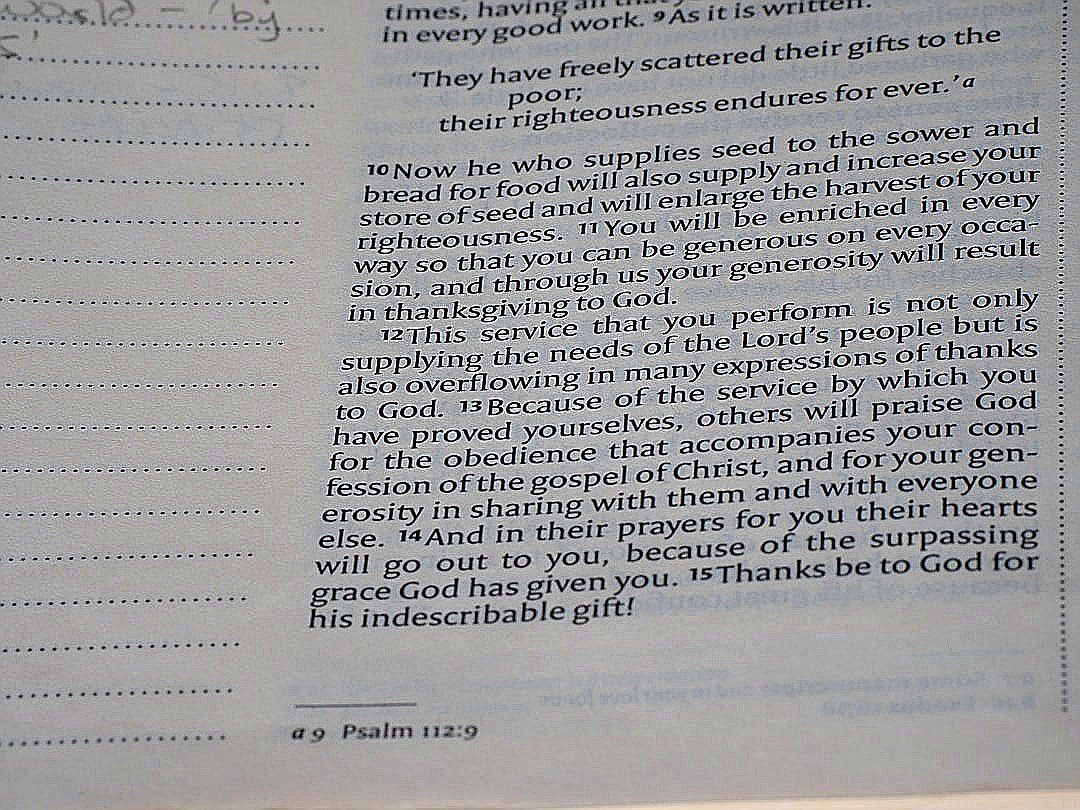 A close up of a book with writing on it