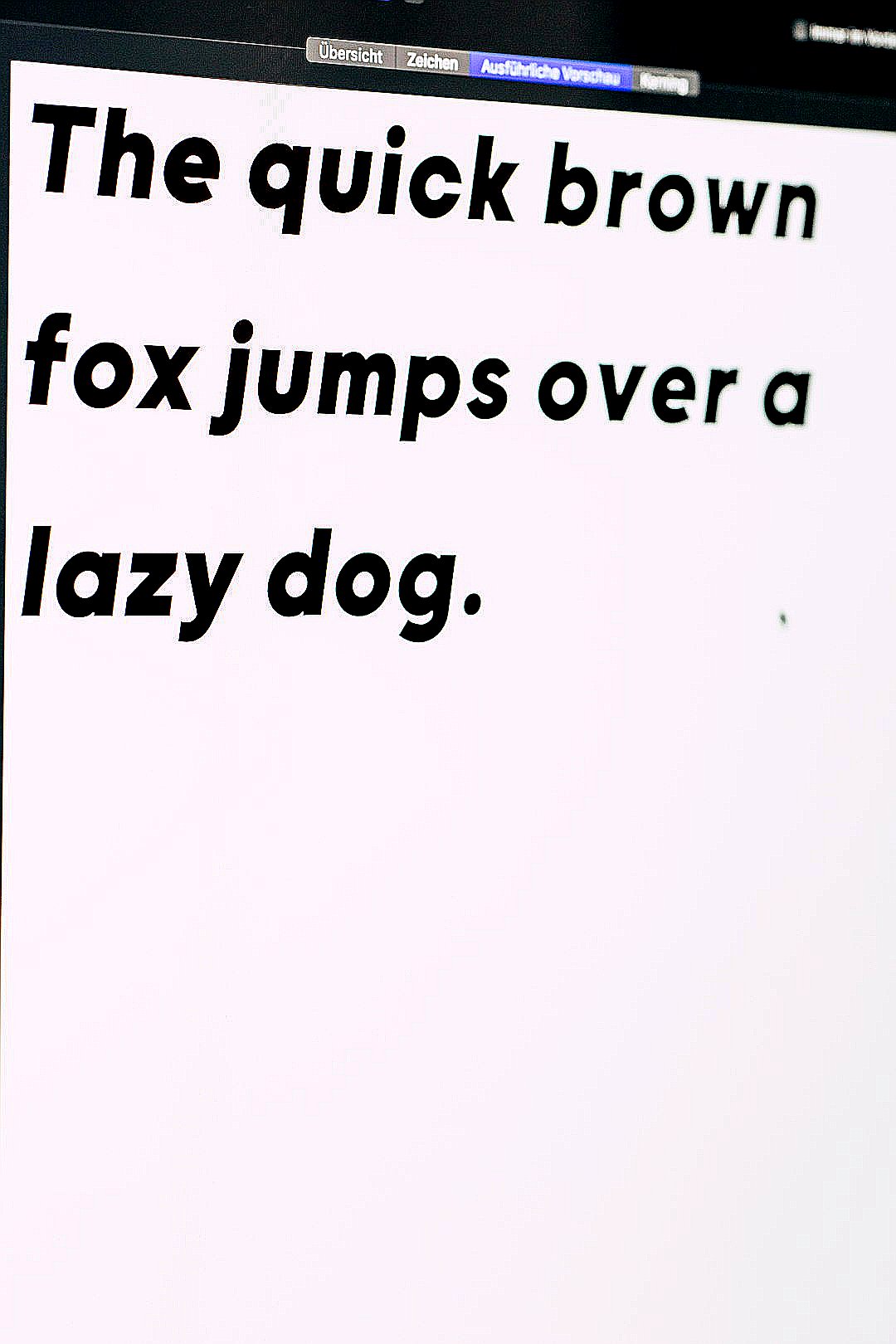 the quick brown fox jumps over a lazy dog text on white background