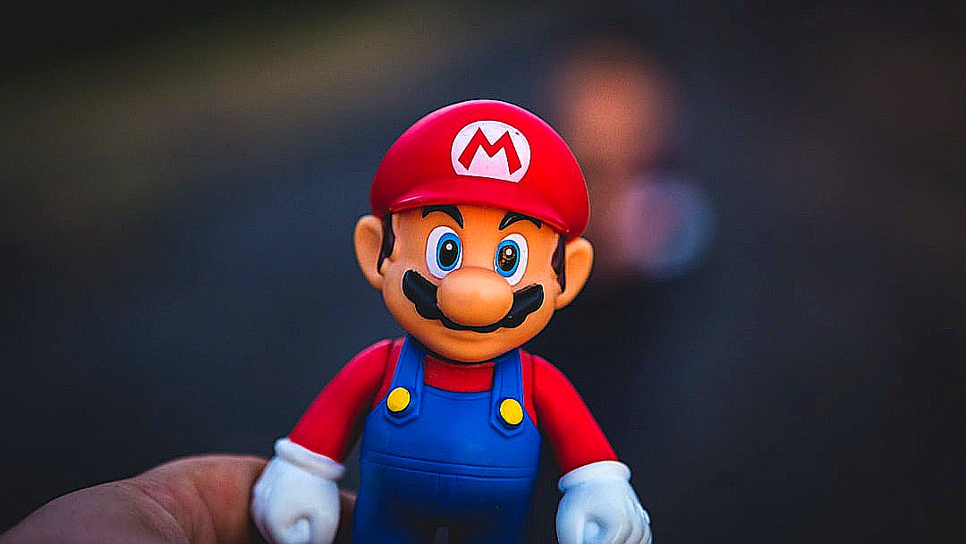 super mario in blue and red shirt figurine