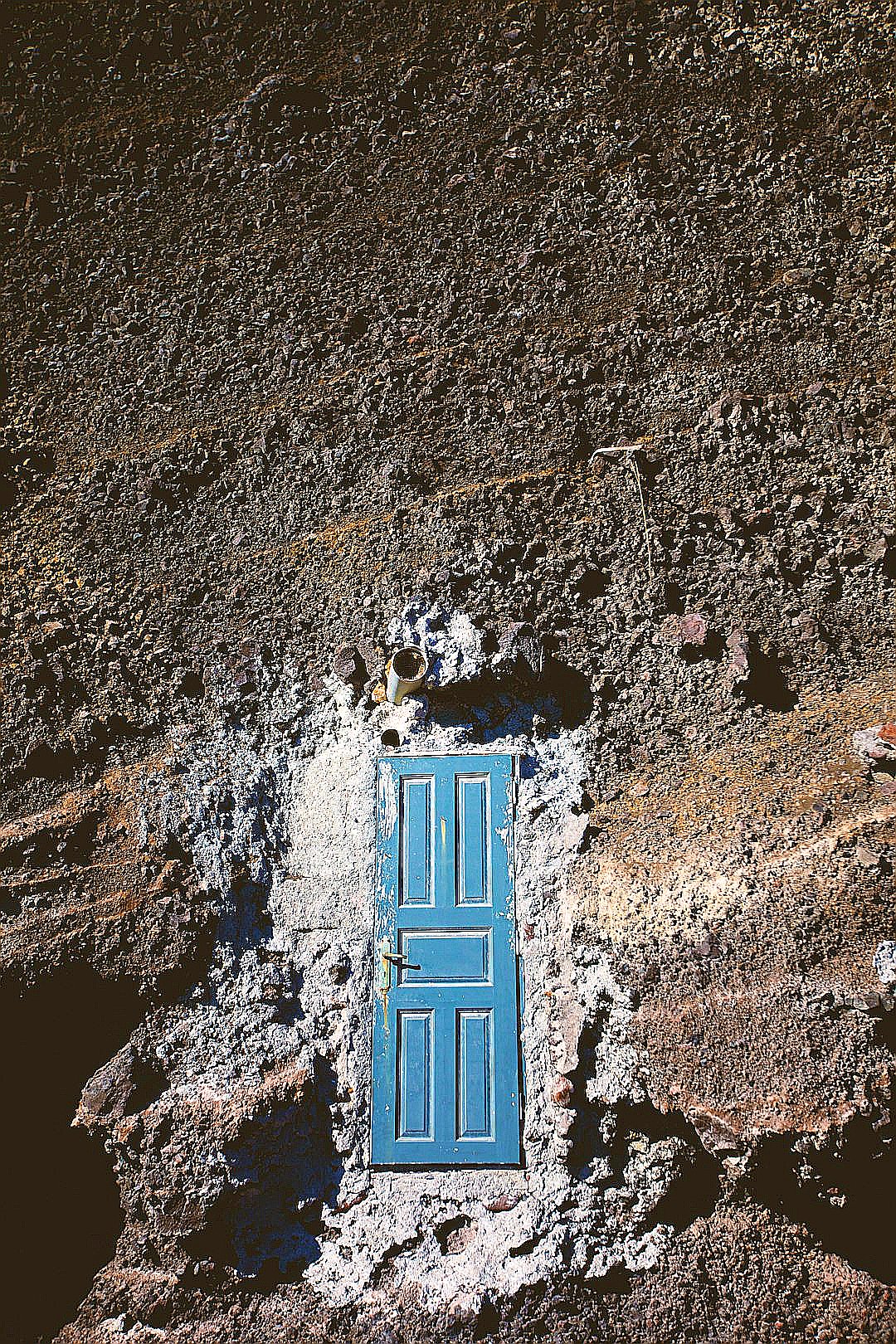 blue wooden 5-panel door