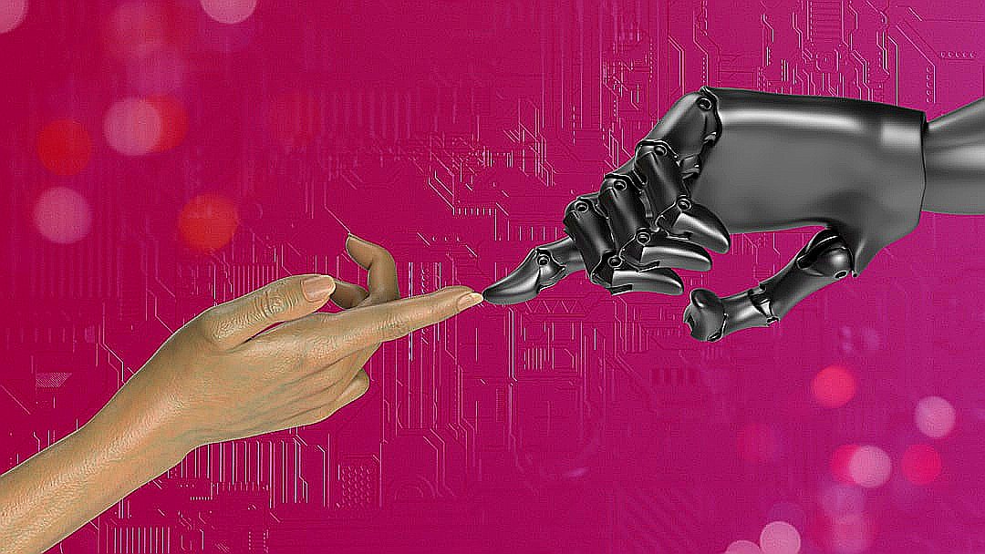two hands touching each other in front of a pink background