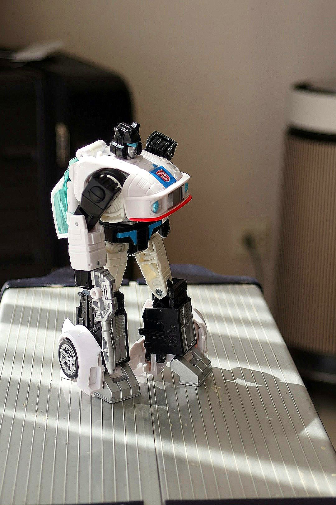 Transformers jazz robot toy standing in sunlight
