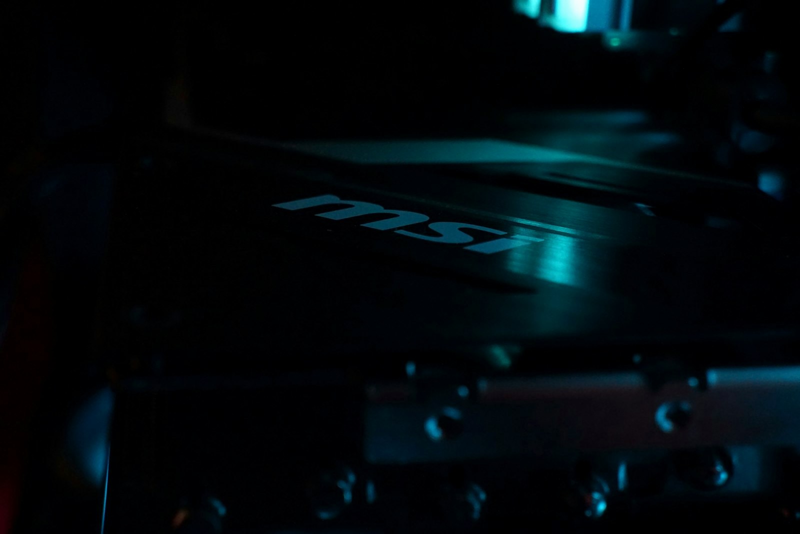 A close up of a computer case in the dark