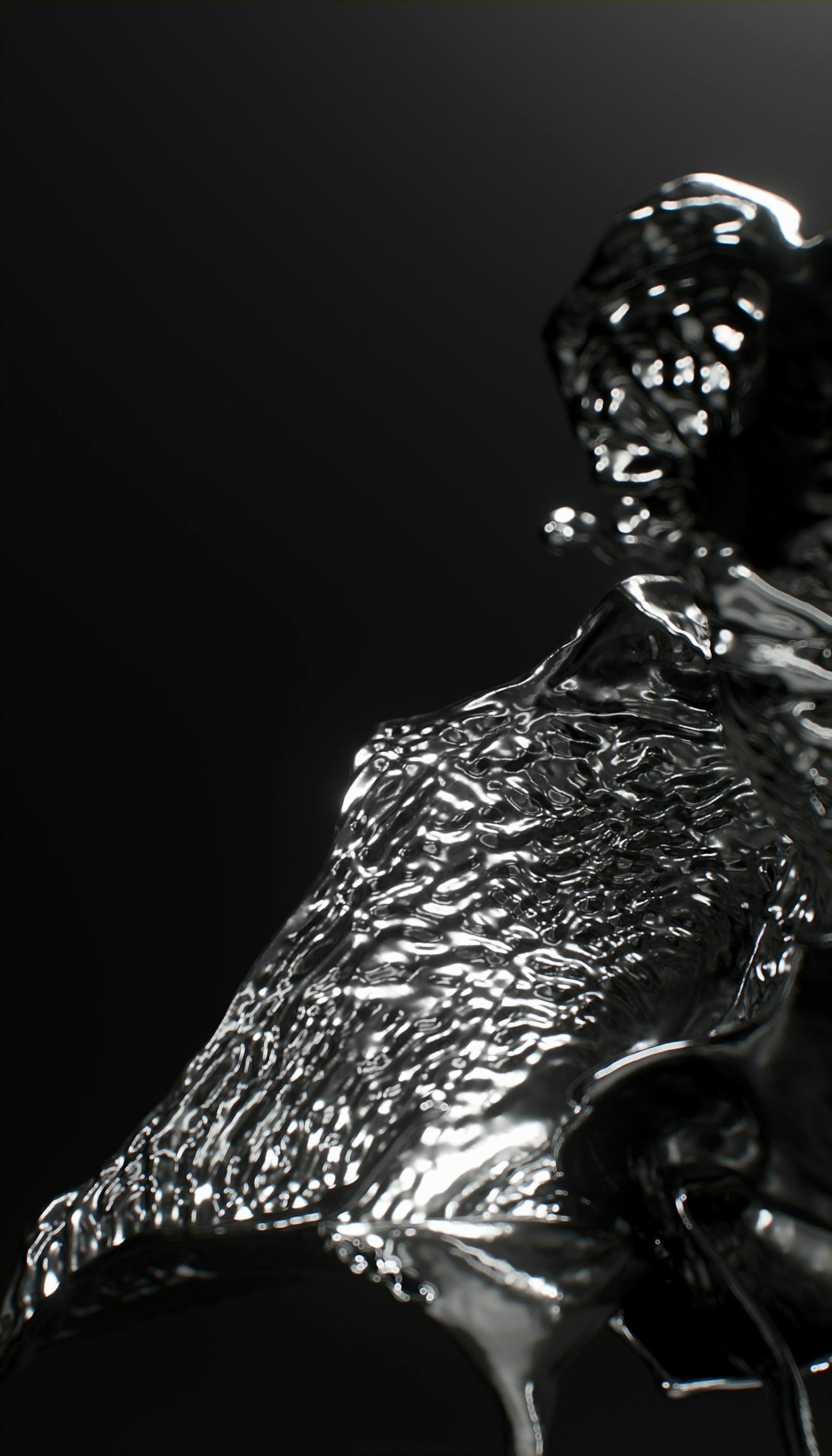 a black and white photo of a bird statue