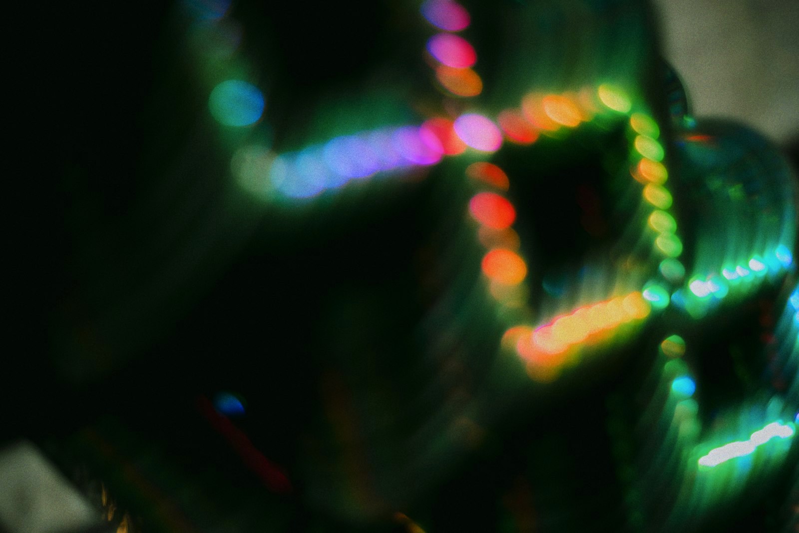 Vibrant, blurred lights form an abstract pattern