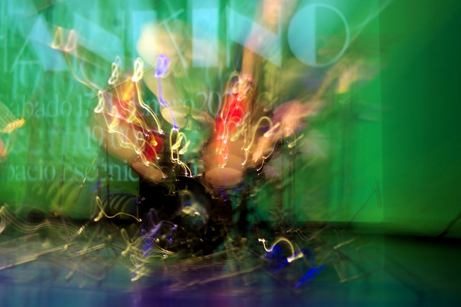 Blurred motion of a person dancing with colorful lights