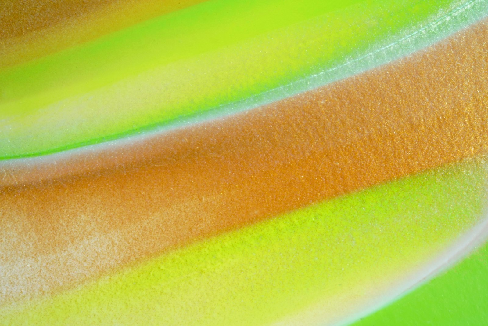 green brown and blue textile