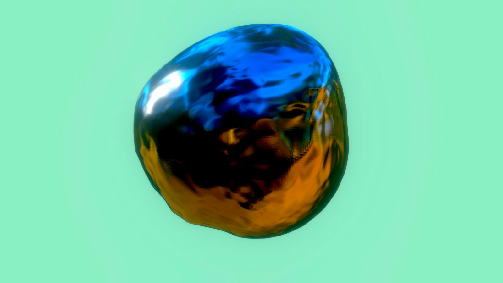 a shiny blue and yellow object on a green background